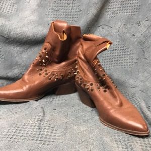 Brown leather and studded ankle boot.